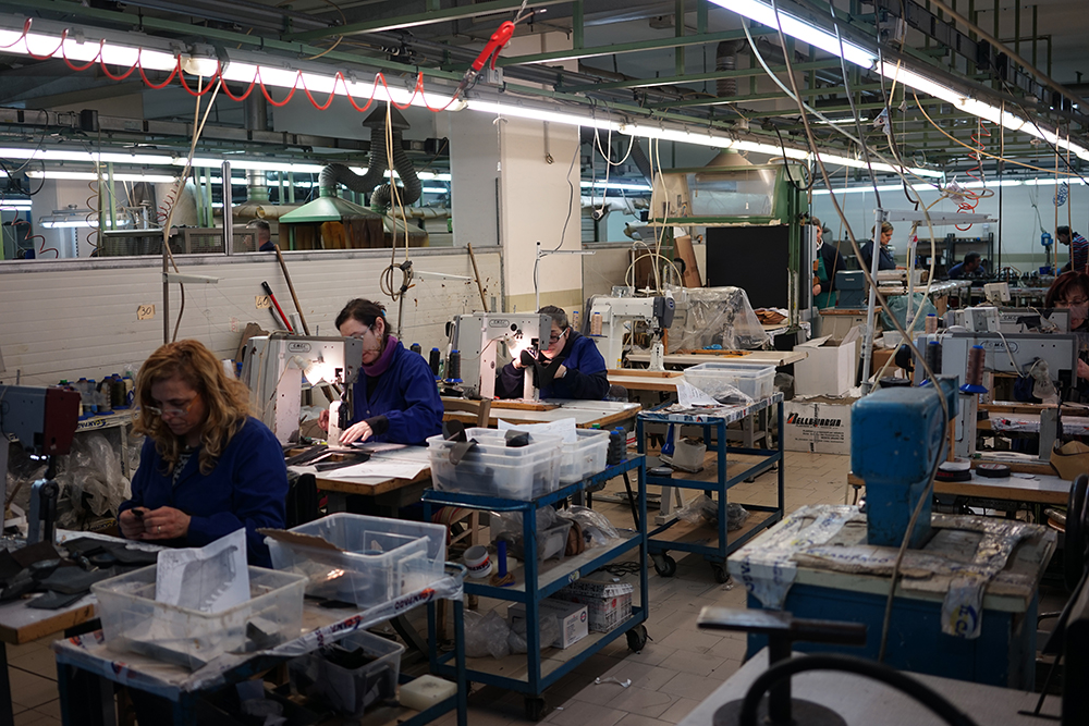 Craftsmen at work in an Italian atelier
