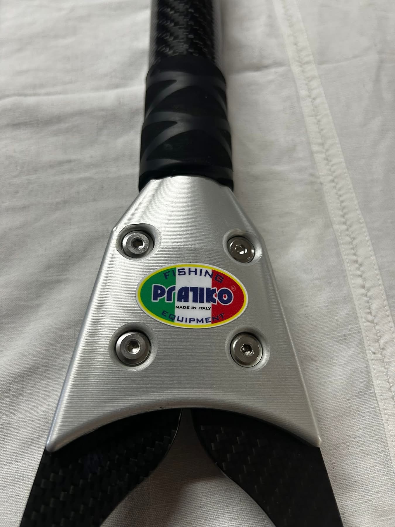 PRATIKO FISHING EQUIPMENT — MADE IN ITALY logo and carbon head