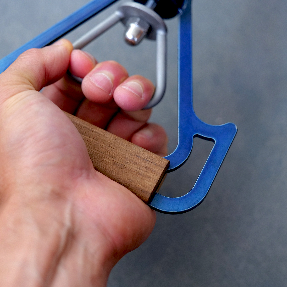 The wooden grip sitting comfortably in hand